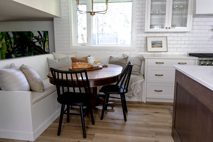 transitional cream kitchen with built in banquette