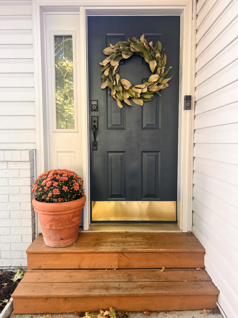 Navy Blue front door with brass kickplate
