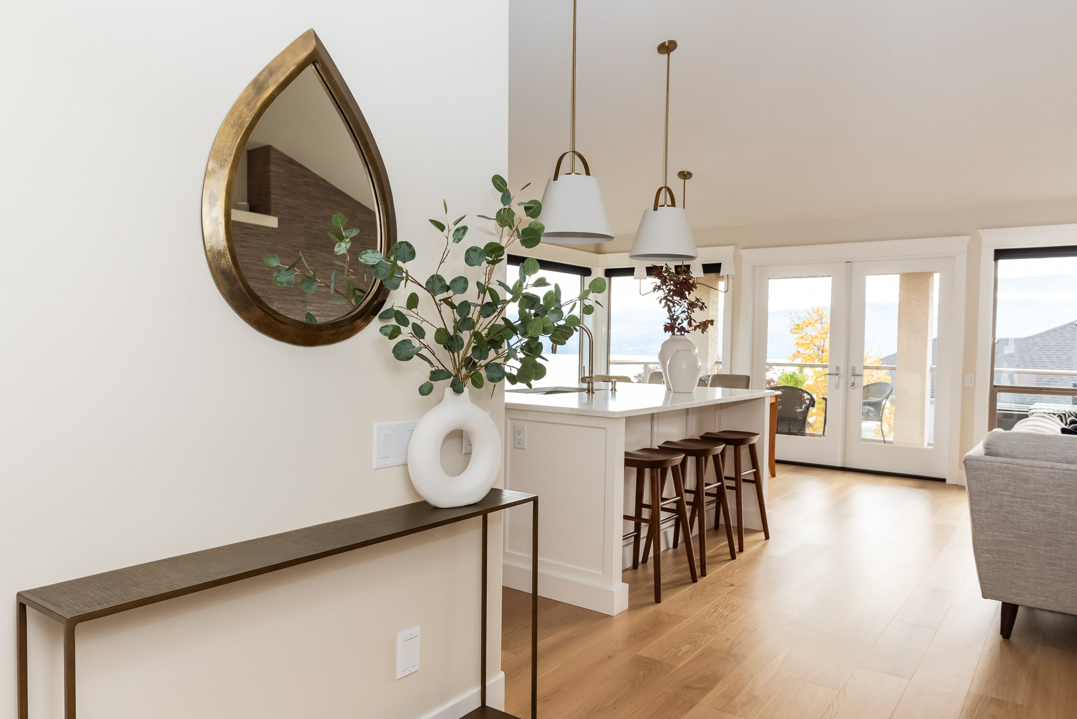 Entry console table into kitchen with a view