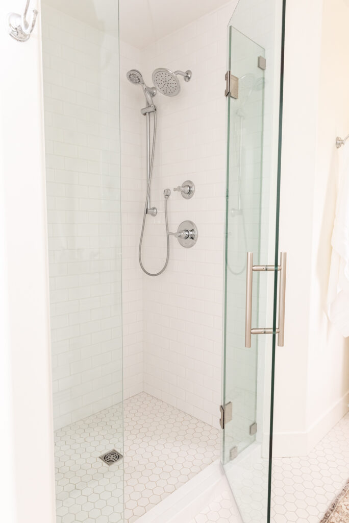 Subway tile shower hex floor tile white bathroom