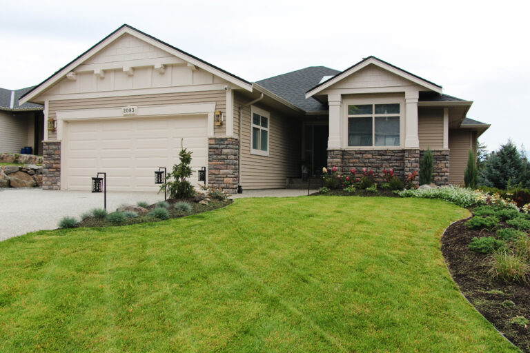 exterior update landscaping and fresh paint on a 2000s home