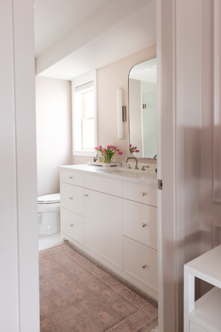 pink bathroom, white vanity