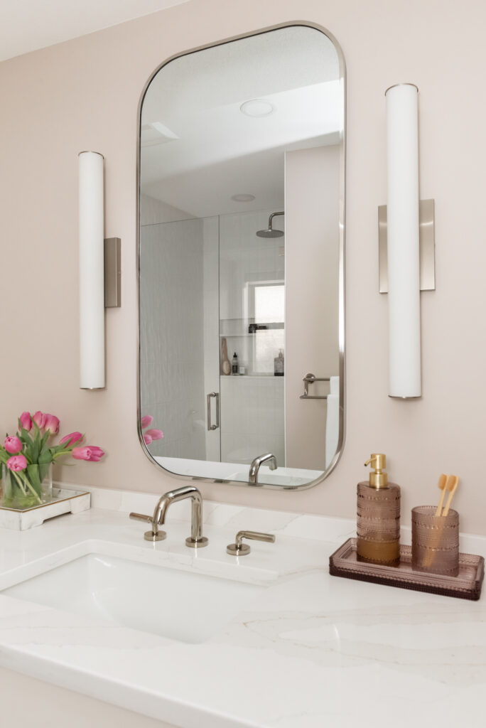 pink bathroom, white vanity