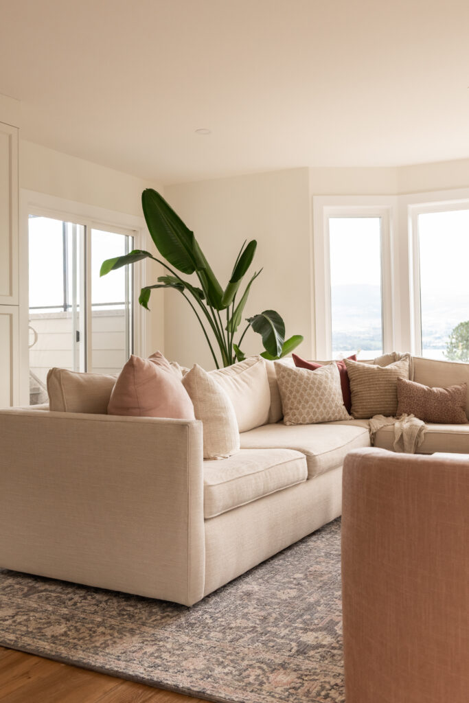 pink living room, swivel chairs, fireplace