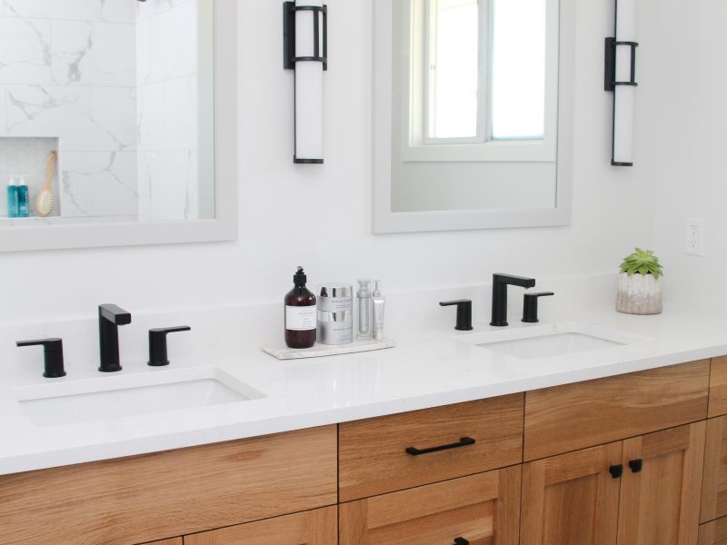 contemporary bathroom, oak vanity, black fixtures