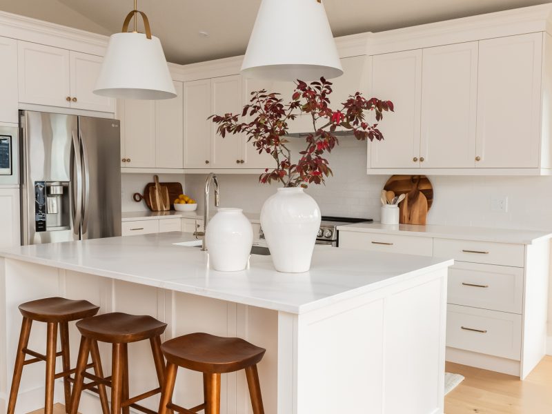 traditional simply white kitchen with wood accents