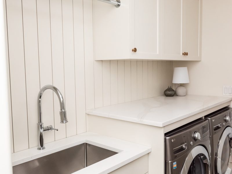 Cream Laundry room shiplap backsplash