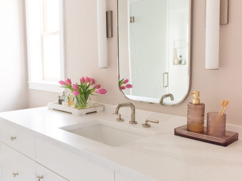 pink bathroom, white vanity