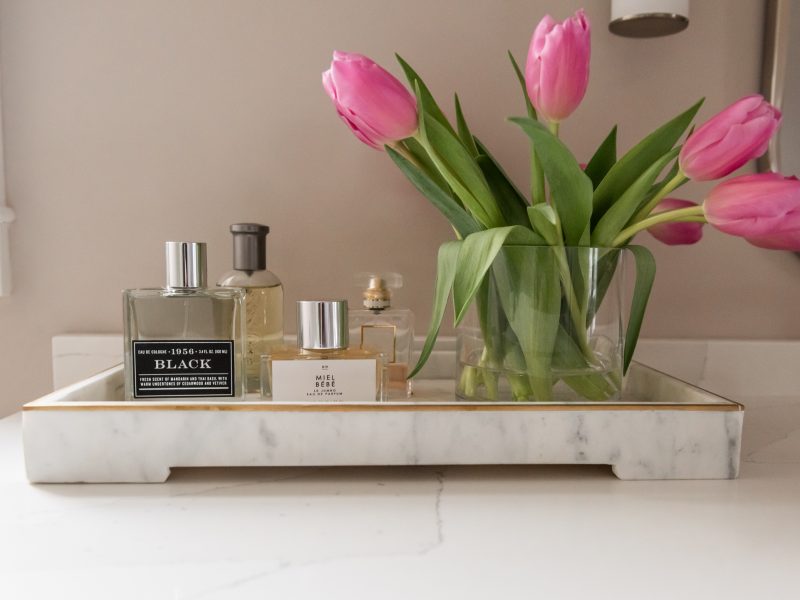 bathroom countertop styling, perfume, pink tulips
